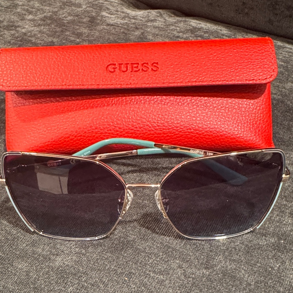 GUESS Women's Red Case Sunglasses with Gold-Tone Frame and Gradient Lenses